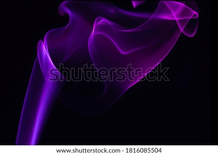 Set of abstract colorful flash-lit smoke on dark background photos