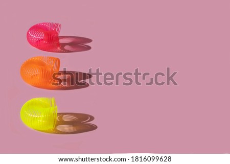 Colorful background of metallic crazy spring to play