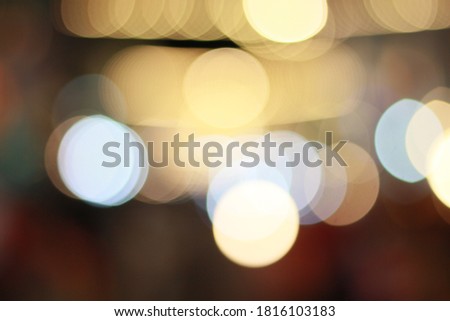 abstract blurred image of Street Night Market festival in Phuket town with bokeh for background usage