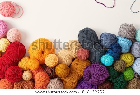  Balls of wool in various colors, on white background Royalty-Free Stock Photo #1816139252