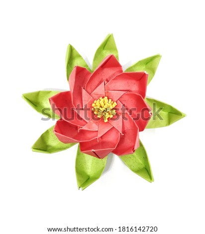 A red yellow green water lotus origami flower isolated on white background 