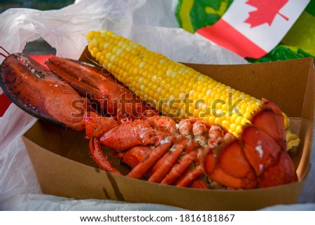 A picture of a lobster lunch.   