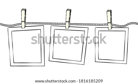 Clothesline with picture frames. Hand drawn vector illustration isolated on white. Seamless pattern, flat color design. Royalty-Free Stock Photo #1816185209