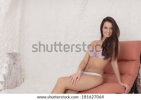 Young woman relaxing in the salt room