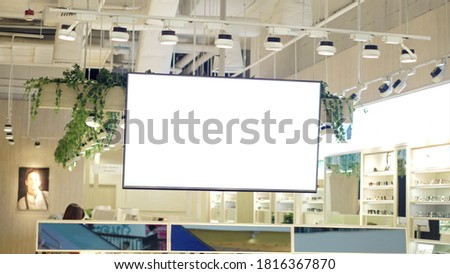 Blank advertising billboard for product display in shopping store.