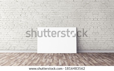White horizontal canvas standing on floor. Blank mock up for design. 