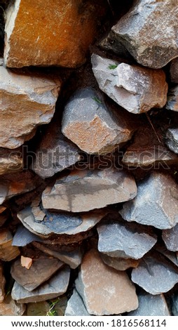 Stone wall, texture, background, gray and rusty stones