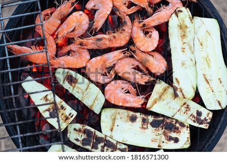 Shrimps on a barbecue grill. Grilled shrimp