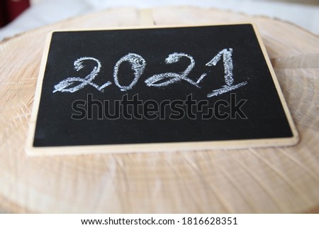 Hand drawn New Year pattern, blackboard Clipart Image. Handwritten by chalk number of New year 2021 Wood background. Black and white. 