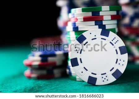 Stack chips poker on a table background. casino gambling concept.