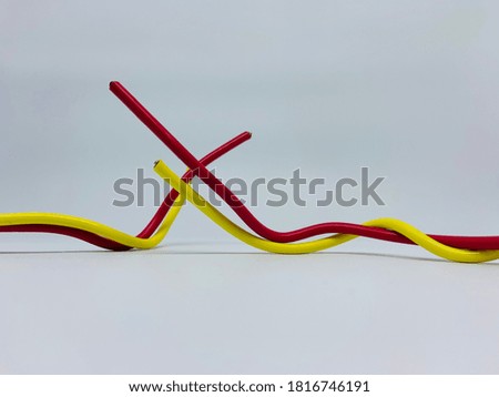yellow red wire and white background