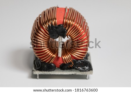 Toroidal cores, ferrite cores, coils and inductors, electronic components Royalty-Free Stock Photo #1816763600