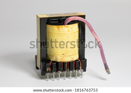 Ferrite core transformers, lectronic components Royalty-Free Stock Photo #1816763753
