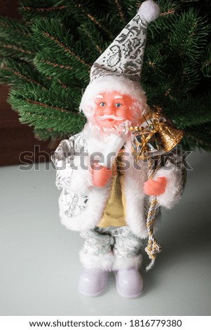 Santa Claus doll with bells