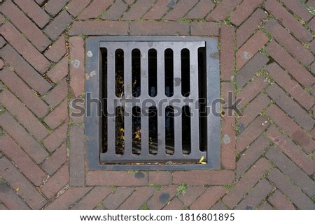 sewer manhole cover in a city street