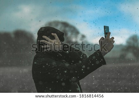 self portrait in a hail storm