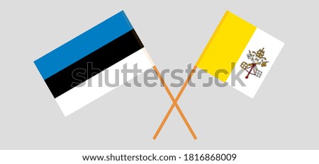 Crossed flags of Vatican and Estonia