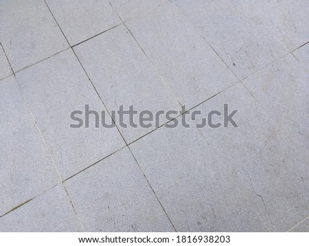 Grey granite tile floor texture pattern background 