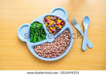 A plate of nutritional meals for children on the table	
