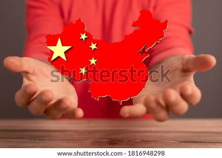 Outlined People's Republic of China map country silhouette in national flag