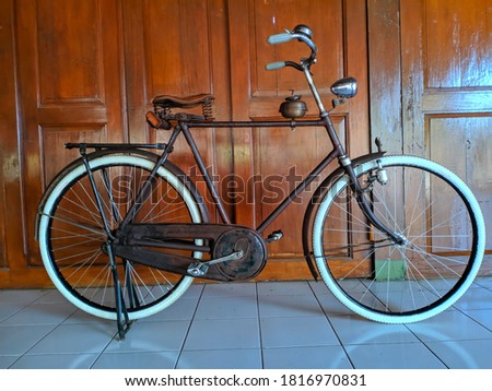 pedaling bicycles made in the 1950s that are still used by residents