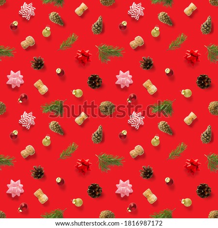 Seamless regular creative Christmas pattern with New Year decorations. xmas Modern Seamless pattern made from christmas decorations. red background