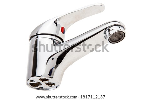 Shiny metal water faucet of the bathtub on a white background