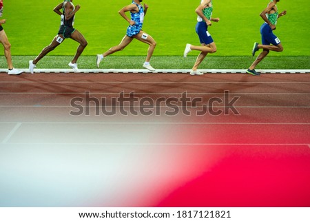 Legs of professional athletes on track and field race. Photo for summer game 2021 in Japan City Tokyo. Running photo, Edit space. 