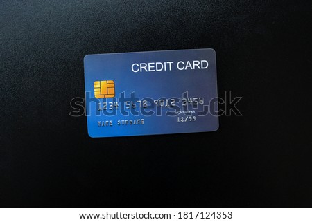 The Blue Credit Card Isolated on Black Background.