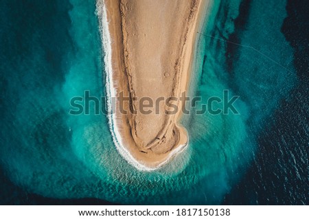 Aerial top-down view of the  Golden Horn, an amazing beach located 2 kilometres west from the harbour town of Bol on the southern coast of the Croatia