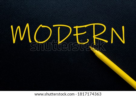 modern Yellow Pen with yellow text own rent at the black background