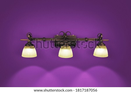 Glass & Metal lamp on dark purple wall background