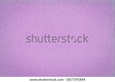 Texture of old purple paper closeup. 