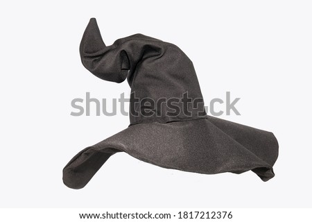 accessories for Halloween,witch hat with curved crown on a white background Royalty-Free Stock Photo #1817212376