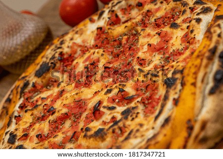 Calzone - Stuffed Pizza with Tomato, Mozzarella and Ham