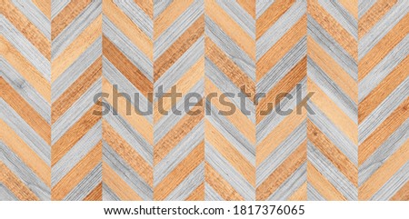 Rough wooden surface. Element of light parquet floor with chevron pattern. Wood texture background. 