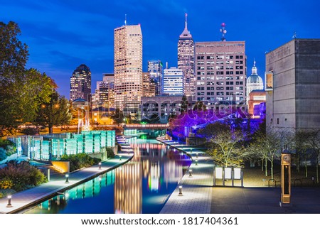 Indianapolis, Indiana, USA skyline and canal at dusk in autumn.