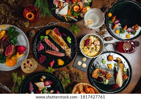 Different colorful meals on dark wooden table. Michelin star chef food. Beautiful food background
 Royalty-Free Stock Photo #1817427761