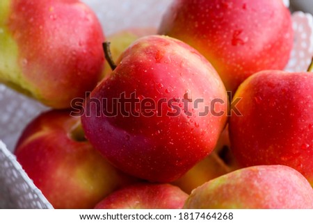 apples in a basket on white background. Apples in a white basket