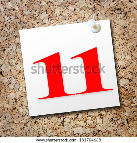 Number 11 on white paper note
