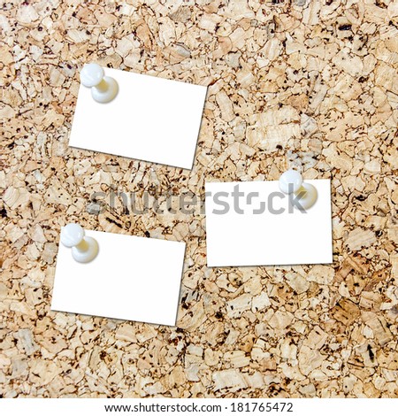 the blank paper note on wood board background