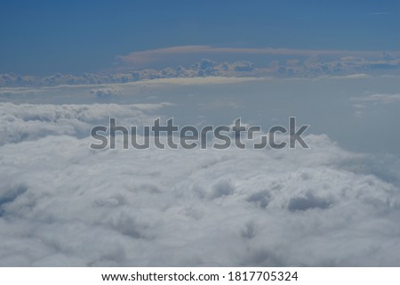 view of clouds above altitude. cumulus clouds are at an altitude of more than 10,000 feet. This cloud includes the type of high cloud. clouds contain details of water and gas that will fall as rain.