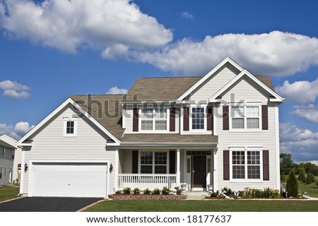 Suburban house seen during summer Royalty-Free Stock Photo #18177637