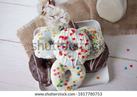 donut, old-fashioned donut, one donut with icing sugar on a white background, close-up. Copy space.  view from above