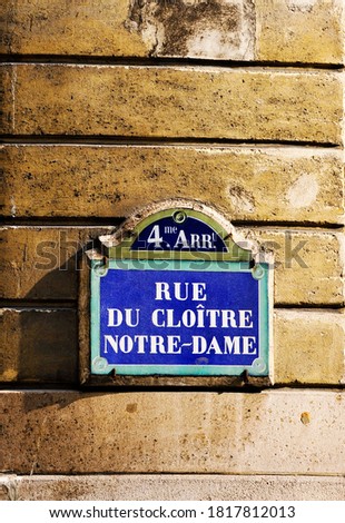 Street of the Cloître Notre-Dame, 4th District - traditional street sign in Paris, France.