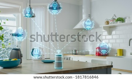 Internet of Things Concept: Modern Kitchen full of High-Tech Kitchen Appliances with IOT, Infographics Show Various Data and Information. Digitalization, Visualization of Home Electronics Devices Royalty-Free Stock Photo #1817816846