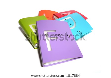 Colorful friends themed photo binder with other themed binders in the background