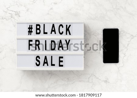 Creative top view flat lay promotion composition with Black friday sale text on lightbox. Template banner online shopping sale mockup 