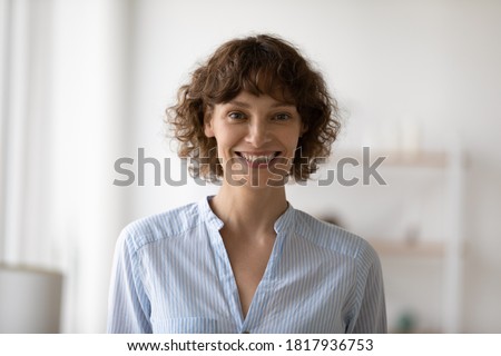 Profile picture of smiling caucasian 40s woman look at camera posing at home. Headshot portrait of happy European female talk on video call or webcam, client or customer satisfied with good service.