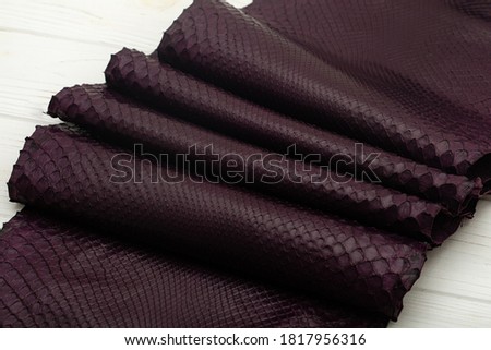 Dark burgundy colored natural python genuine leather 